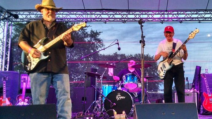 DeltaMikeShawBand_WinterSaturday2022 Delta Mike Shaw band playing music on stage.
