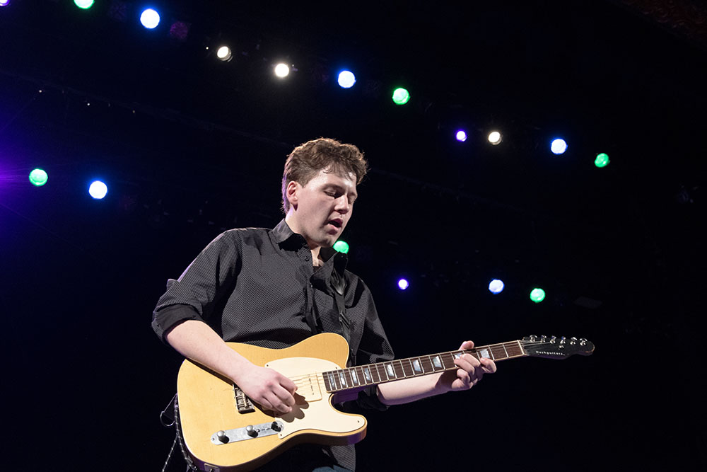 Gabe Stillman playing guitar.