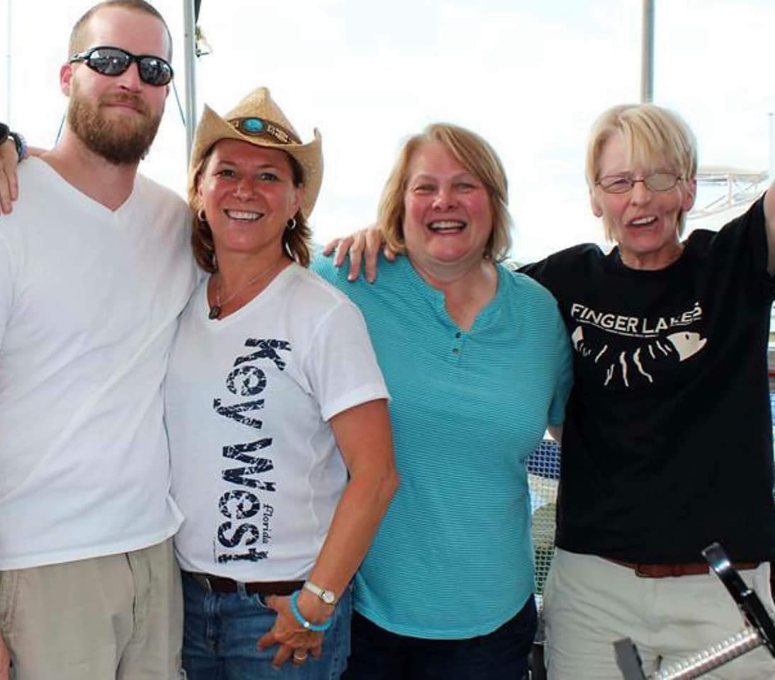 Robin Burnett and a band posing for photo.