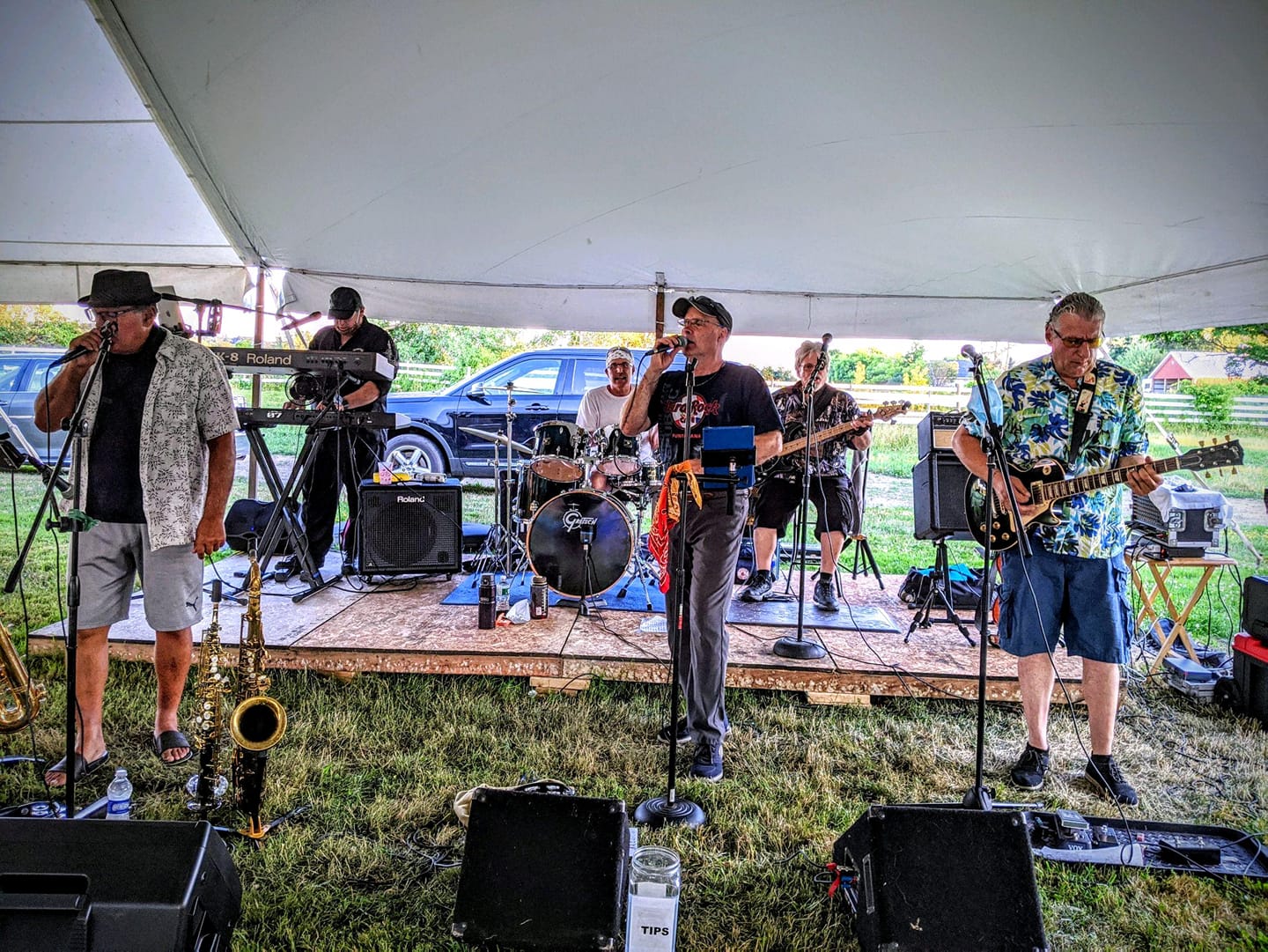 The Roll the Dice Band playing at the Oasis tent.