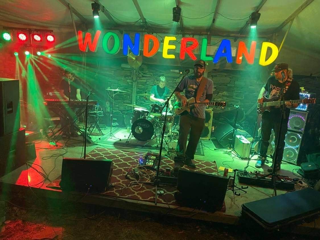 The band Stereopticon playing a live show.