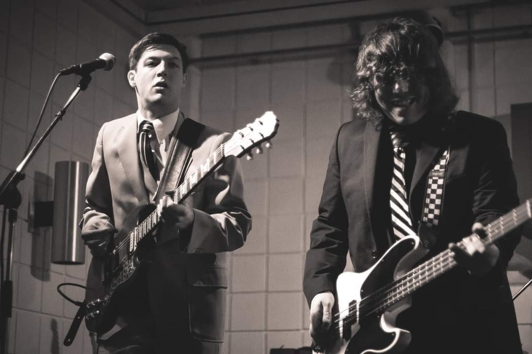 FB_IMG_1657052723951 (002)_GravyBoat Two guys playing guitar with microphone stands.