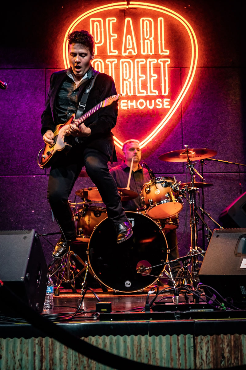 Gabe Stillman playing guitar.