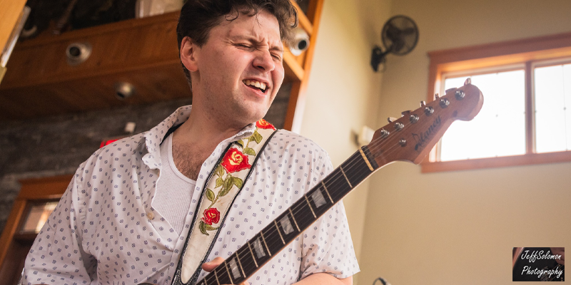 GabeStillman Gabe Stillman rocking out on the guitar in house.