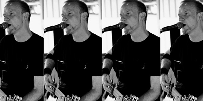 MikeCavalier Mike Cavalier singing live music and playing guitar.